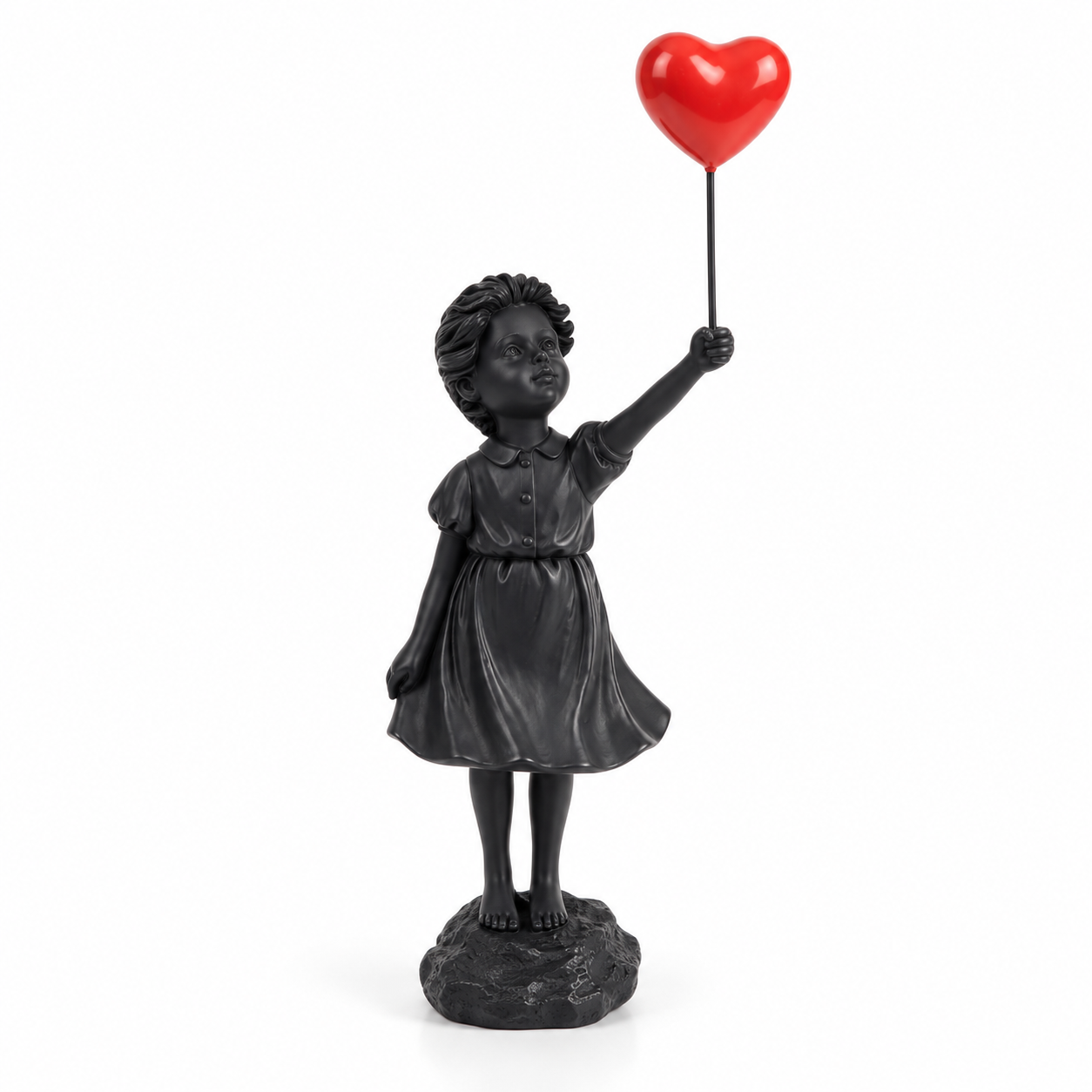 Held in Hope girl with heart balloon sculpture in black & red, on a white studio background
