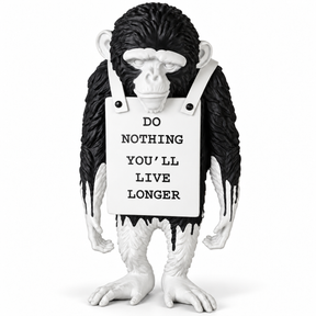 Silent Protest sculpture in black drip, on a white studio background