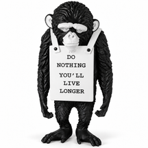 Silent Protest sculpture in classic black & white, on a white studio background