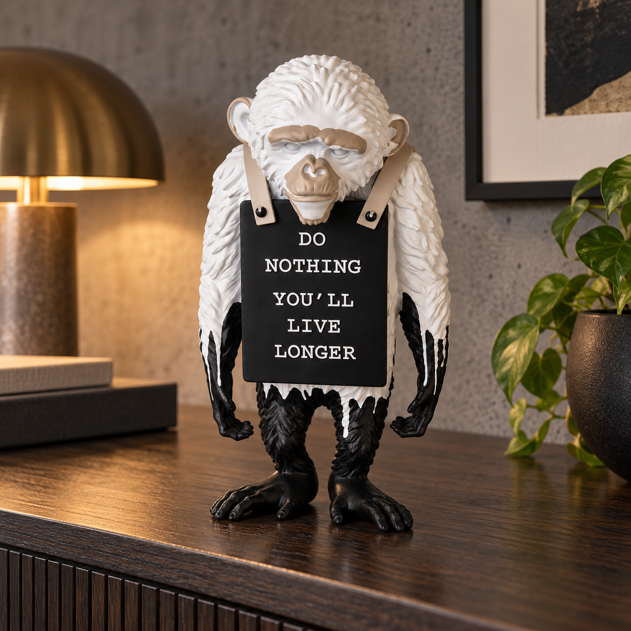 Silent Protest sculpture in white drip, displayed in a styled interior